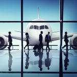 Business People Corporate Travel Airport Concept - HospitalityLawyer.com®