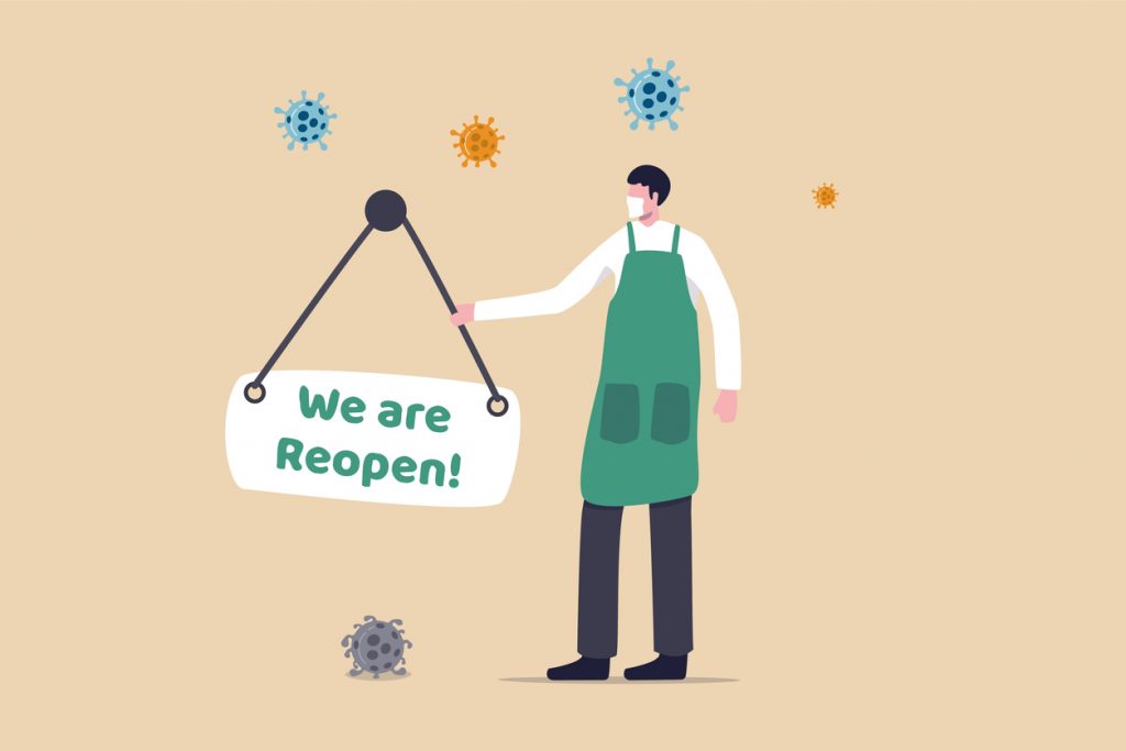 Company or entrepreneur reopen business after COVID-19 pandemic Coronavirus quarantine lockdown concept, shop owner man wearing face mask hanging store front Reopen sign with Coronavirus pathogen. - HospitalityLawyer.com®