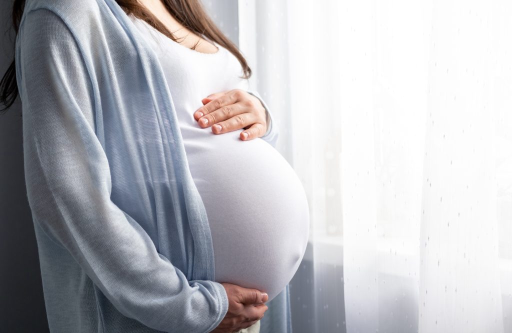 healthy pregnancy Side view pregnant woman with big belly advanced pregnancy in hands Banner copyspace for text Elegant mother waiting baby - HospitalityLawyer.com® Side view pregnant woman with big belly advanced pregnancy in hands. Banner copyspace for text. Elegant mother waiting baby