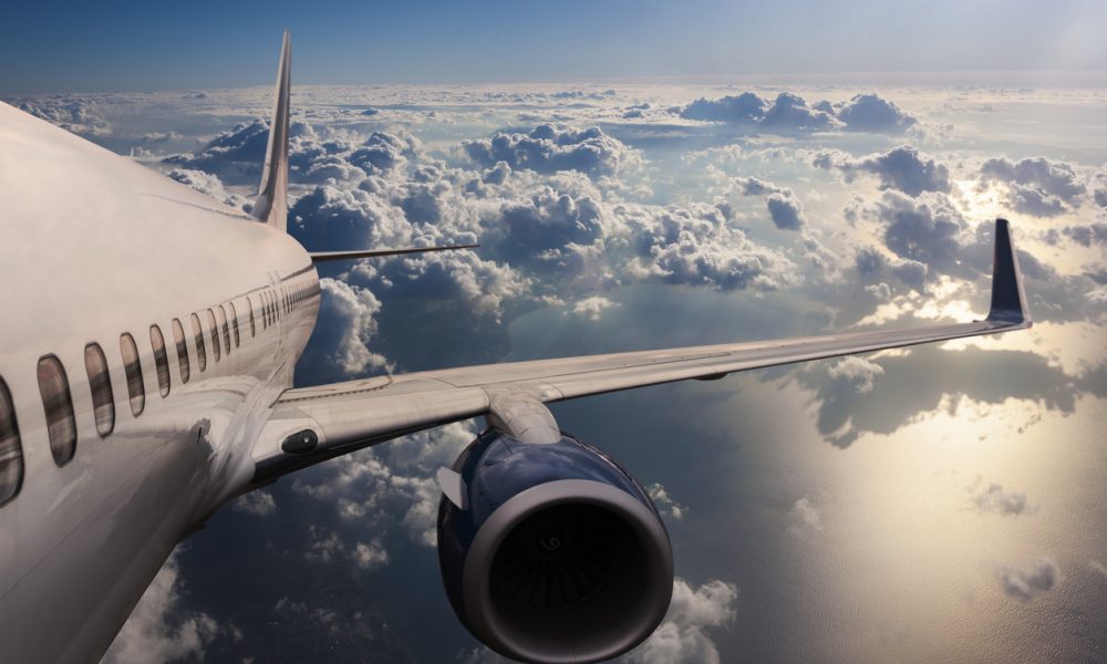Body of an Airplane Flying Through Dark Clouds