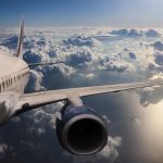 Body of an Airplane Flying Through Dark Clouds - HospitalityLawyer.com® Body of an Airplane Flying Through Dark Clouds
