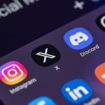 New social media apps formerly twitter x and threads on smart phone screen - HospitalityLawyer.com® Social media applications X, instagram, LinkedIn, discord, reddit, Threads, Facebook on smart phone screen.