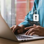 Cybersecurity and privacy concepts to protect data Lock icon and internet network security technology Businessmen protecting personal data on laptop and virtual interfaces - HospitalityLawyer.com®