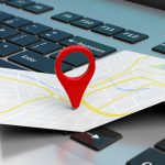 Map pointer location on a laptop 3d illustration - HospitalityLawyer.com®