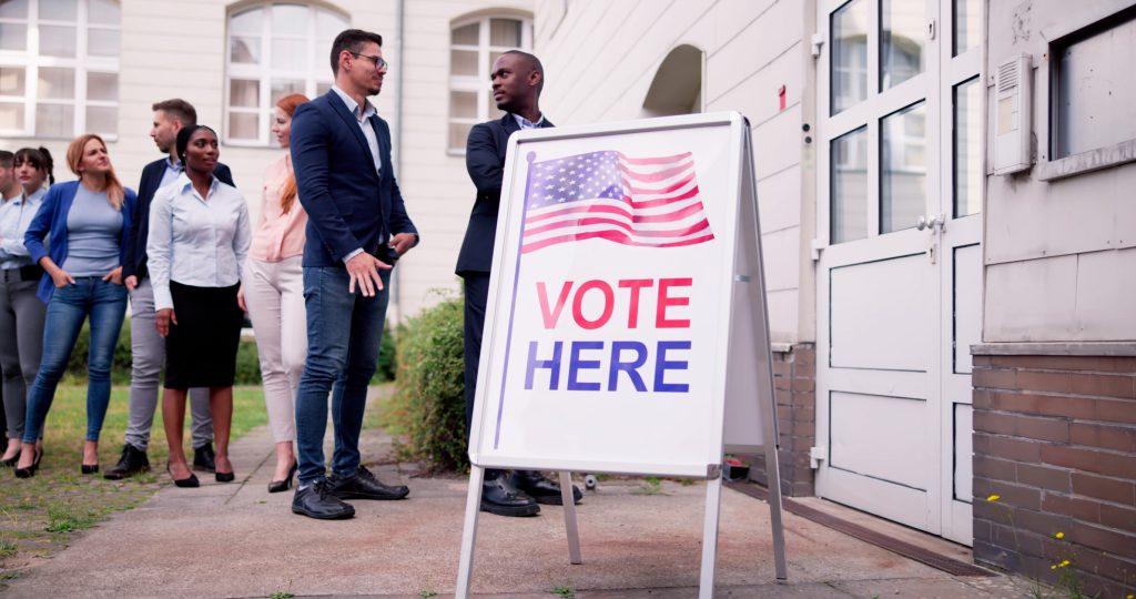 Diverse People At Voting Booth - HospitalityLawyer.com®