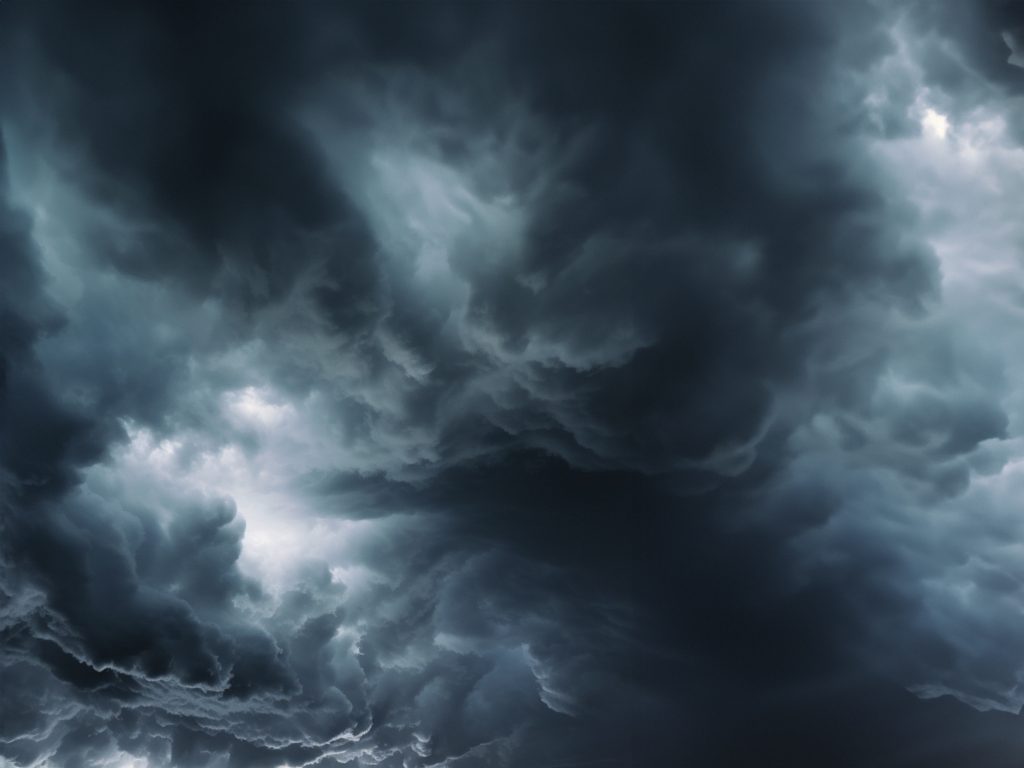 Threatening dark clouds covering the sky - HospitalityLawyer.com®