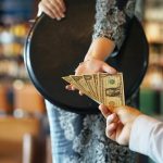 Girl of the waitress gets a tip - HospitalityLawyer.com®